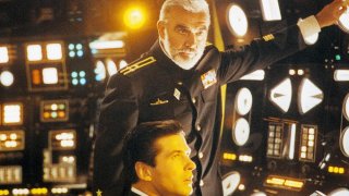 The Hunt for Red October / ”На лов за Червения октомври”
Истински класически екшън трилър, който акцентира на интелекта, логиката, интуицията и политическата гъвкавост за сметка на силата. Основна заслуга има режисьорът Джон Мактиърнън, който успява съвсем гладко и разбираемо да адаптира за големия екран сложния стил на писане на Кланси. Естествено, важна роля за успеха на филма имат и двамата актьори в главните роли - Алек Болдуин, който изиграва култовия агент на ЦРУ Джак Райън, и Шон Конъри, на който даже шотландския акцент не му попречи да се превъплъти в ролята на съветския капитан-беглец Марко Рамиус. Че даже и получи номинация за “Оскар” за нея.