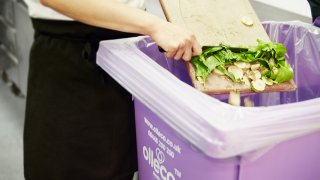 food-waste-being-put-into-bin