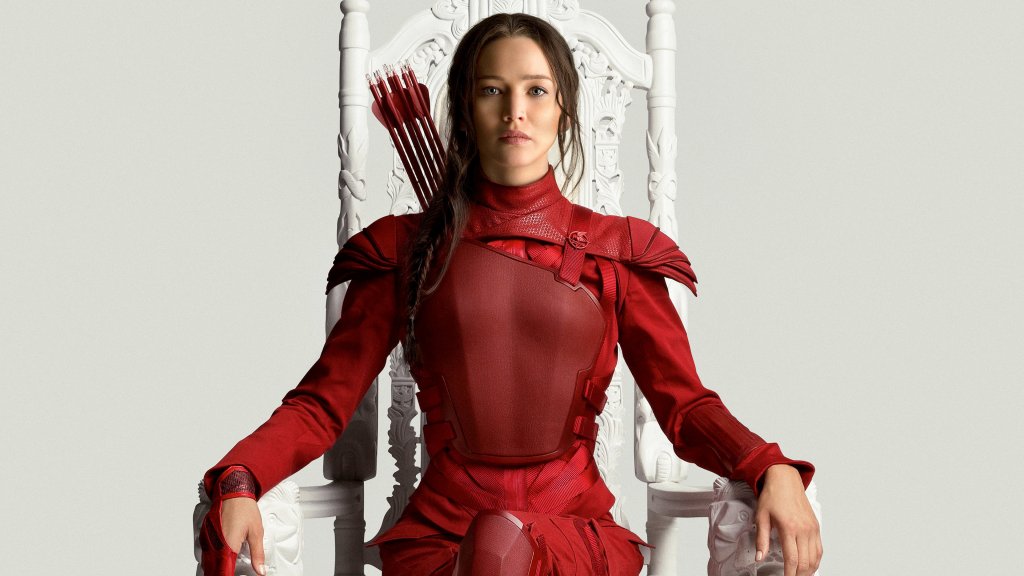Дженифър Лорънс в "The Hunger Games" 
Катнис трябваше да защити сестра си и това я направи искрата на бунт срещу Президента. 