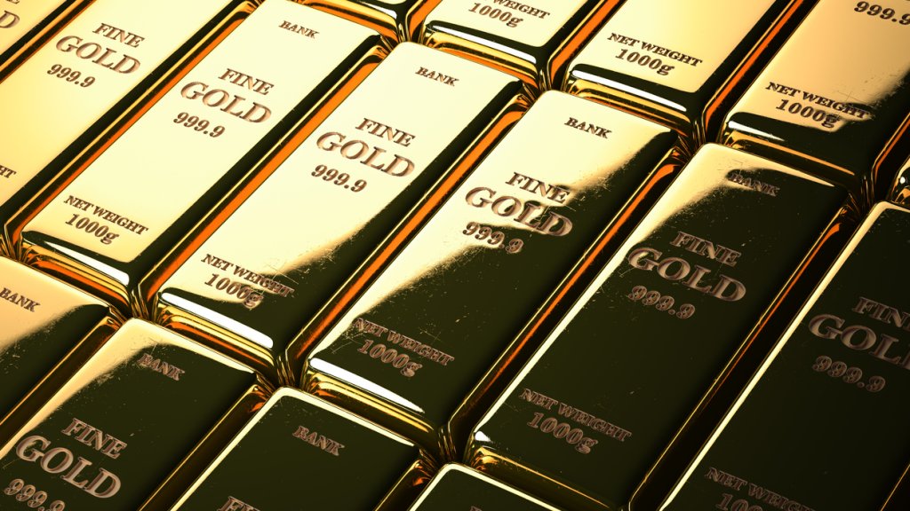 Gold bars or ingots in a row. Financial  and investment concept.