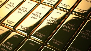 Gold bars or ingots in a row. Financial  and investment concept.