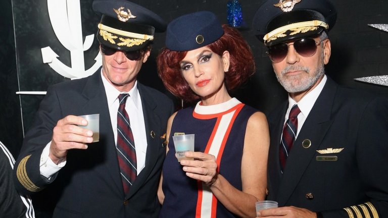Бившият модел Ранд Гребер, Синди Крофорд и актьорът Джордж Клуни като екипаж на самолет.