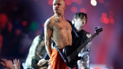 Ник Кейв смята музиката на Red Hot Chili Peppers за боклук, но Флий го боготвори