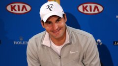 Роджър Федерер започна с победа участието си в Откритото първенство на САЩ и изравни рекорда на Андре Агаси за спечелени победи в турнирите от Големия шлем