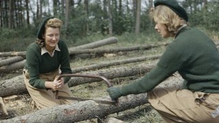 1280px-Land_Army_girls_sawing_larch_poles_for_use_as_pit_props_at_the_Women's_Timber_Corps_training_camp_at_Culford_in_Suffolk._TR912