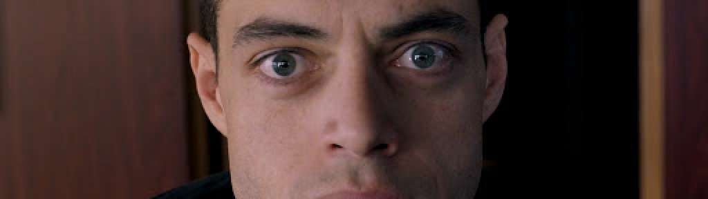 Mr. Robot
Анархизъм във времето на технологичния прогрес и големите банки - Mr. Robot не е сериал за всеки вкус, но никой не може да отрече неговата гениалност. Рами Малек и Крисчън Слейтър правят страхотно изпълнение, докато представят един нихилистичен, мрачен поглед върху съвременния свят, в който всичко може да бъде сведено до нули и единици. В центъра на историята е Елиът - служител на малка компания за киберсигурност, страдащ от рядко заболяване, свързано с разстройство на личността. Така в един момент с него се свързва мистериозен социален-анархист, известен само като Г-н Робот, за да изпълни голямата му цел - тотален срив на сегашния консуматорски свят и неговите големи корпорации, начело с вездесъщата Е-Корп. Въобще един съвременен "Боен клуб" с всичките му положителни моменти.