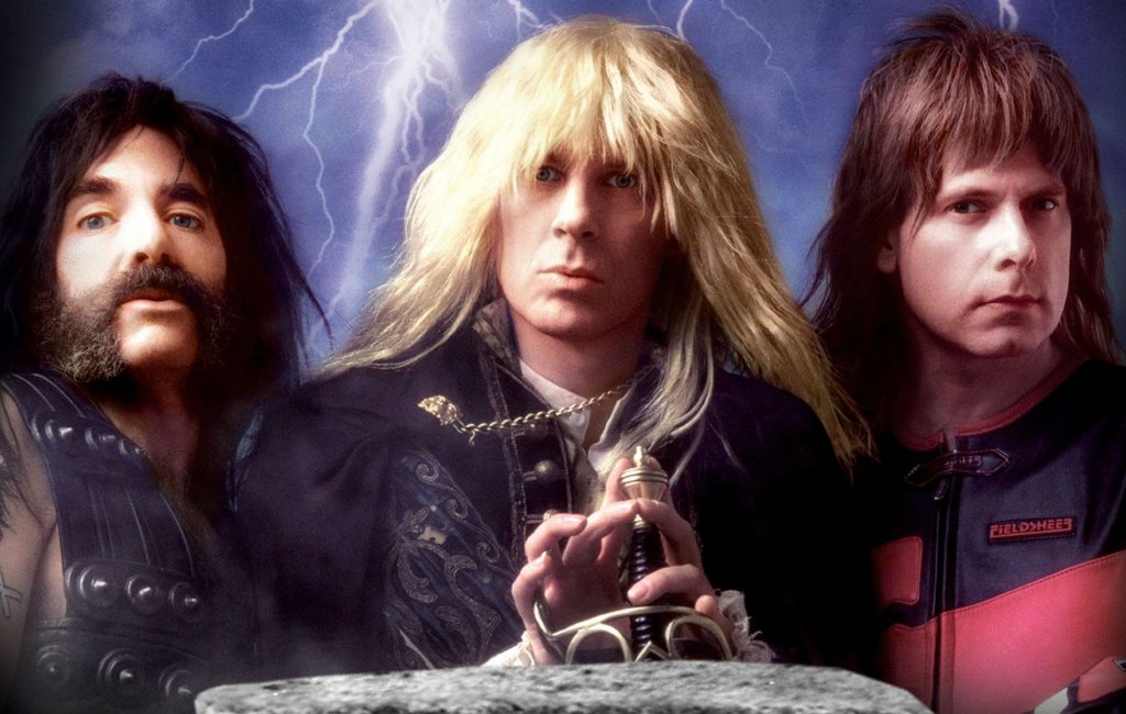 This Is Spinal Tap
Когато става въпрос за рокаджийски филми, This Is Spinal Tap е култово заглавие. Заснет като фалшив документален филм за измислената банда Spinal Tap, дебютът на режисьора Роб Райнър ("Мъже на честта") е забавен поглед към всички онези клишета за рок музикантите. Сюжетът показва как един документалист следва британската банда, съставена от приятели от детинство, по време на голямото им турне в Америка. А това, което се вижда, са едни разглезени пораснали деца, които са на крачка от разпадането като колектив. Самият филм е адски забавен и пълен както с шеги, така и с тежки хитове.