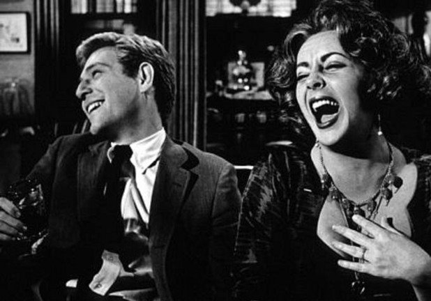 “Кой се страхува от Вирджиния Улф?”(1966)
“Любезно сте поканени при Джордж и Марта за вечеря на удоволствие и игри”, гласи подзаглавието на кинодебюта на Майк Никълс, адаптация на едноименната известна пиеса. И за няколко кратки мига, в началните напдиси, докато Джордж (Ричард Бъртън) и Марта (Елизабет Тейлър) крачат ръка за ръка към къщи от парти, усещането е като да гледате две бобчета в любовна шушулка. Те влизат и са изречени първите думи. “Що за дупка!” изригва Марта, докато се подготвя за поредното питие и обичайната борба на остроумие, превъзходство, полове и семейна политика със също толкова озлобения си съпруг. За тези двама ветерани любовните импулси са заровени под слоеве на язвителност и измама. Благодарение на великолепната адаптация от Ърнест Леман на пиесата на Едуард Олби, ‘Вирджиния Улф’ и с анималистичната свирепост, изливаща се от Тейлър и Бъртън (подобно на други примери тук, двамата са били женени по това време), режисурата на Никълс лесно би могла да се окаже на заден план, но това не се случва. Невероятно е, че това е първият му филм, но той кинематографски разкрасява (с близки планове, панорами, следващи чаша уиски, Джордж и Марта в кръгли прозорци и други) достатъчно много, за да го вкара във висшия ешелон на филмите, занимаващи се с “противен, съсипващ брак”, както крещи Марта в разрушителния финал. Ако “Женена двойка” е най-забавният, а “Съпрузи и съпруги” е най-остроумният, "Вирджиния Улф" е най-интересният филм в тази галерия
