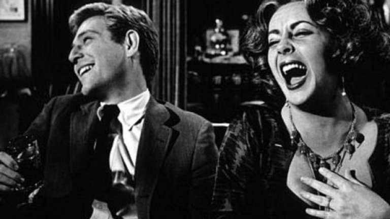 “Кой се страхува от Вирджиния Улф?”(1966)
“Любезно сте поканени при Джордж и Марта за вечеря на удоволствие и игри”, гласи подзаглавието на кинодебюта на Майк Никълс, адаптация на едноименната известна пиеса. И за няколко кратки мига, в началните напдиси, докато Джордж (Ричард Бъртън) и Марта (Елизабет Тейлър) крачат ръка за ръка към къщи от парти, усещането е като да гледате две бобчета в любовна шушулка. Те влизат и са изречени първите думи. “Що за дупка!” изригва Марта, докато се подготвя за поредното питие и обичайната борба на остроумие, превъзходство, полове и семейна политика със също толкова озлобения си съпруг. За тези двама ветерани любовните импулси са заровени под слоеве на язвителност и измама. Благодарение на великолепната адаптация от Ърнест Леман на пиесата на Едуард Олби, ‘Вирджиния Улф’ и с анималистичната свирепост, изливаща се от Тейлър и Бъртън (подобно на други примери тук, двамата са били женени по това време), режисурата на Никълс лесно би могла да се окаже на заден план, но това не се случва. Невероятно е, че това е първият му филм, но той кинематографски разкрасява (с близки планове, панорами, следващи чаша уиски, Джордж и Марта в кръгли прозорци и други) достатъчно много, за да го вкара във висшия ешелон на филмите, занимаващи се с “противен, съсипващ брак”, както крещи Марта в разрушителния финал. Ако “Женена двойка” е най-забавният, а “Съпрузи и съпруги” е най-остроумният, "Вирджиния Улф" е най-интересният филм в тази галерия
