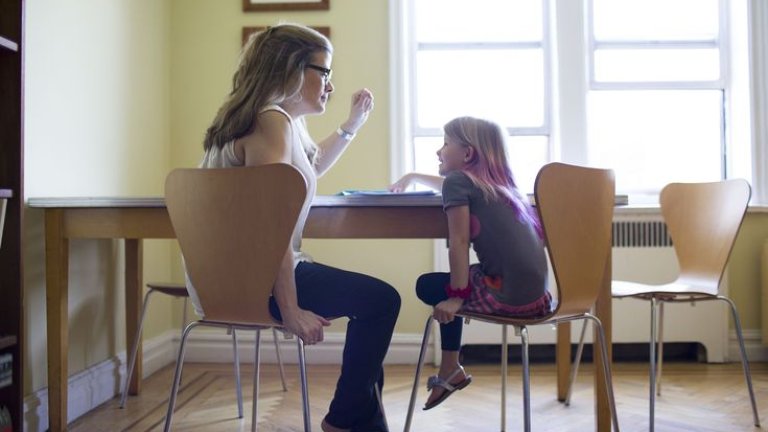 mother-helping-daughter-with-homework-540036109-59444c225f9b58d58a418358