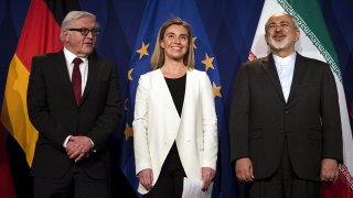 Iranian Foreign Minister Zarif stand with German Foreign Minister Steinmeier and EU High Representative for Foreign Affairs Mogherini following nuclear talks in Lausanne