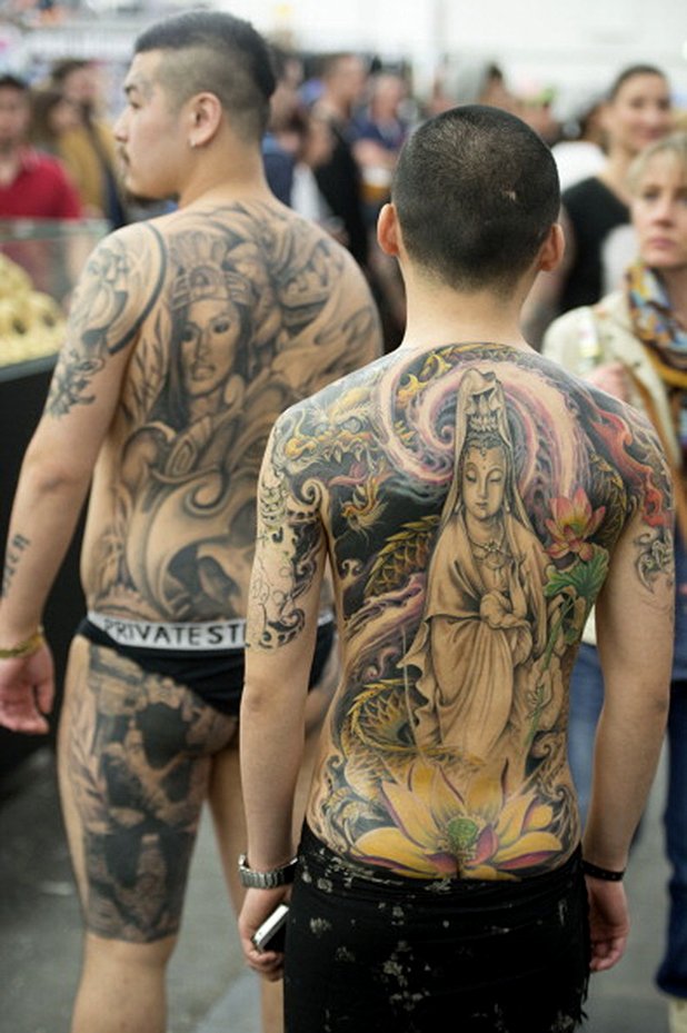 Модели на татуси, заснети по време на 22-рия Международна конгрес на татусите във Франкфурт на Майн, Германия