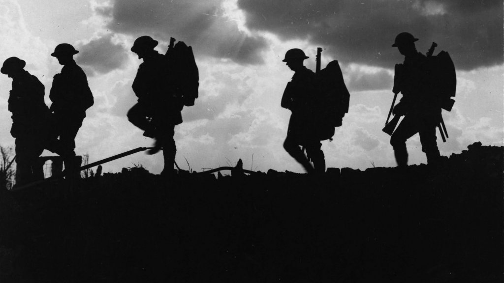 NLS_Haig_-_Troops_moving_up_at_eventide_-_men_of_a_Yorkshire_regiment_on_the_march_(cropped)