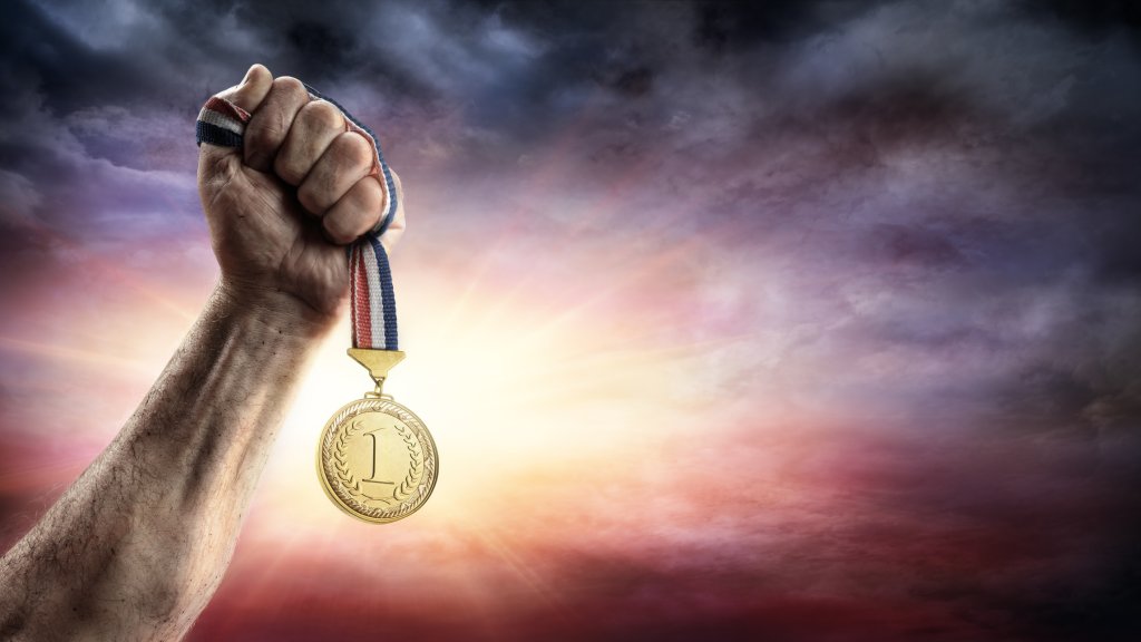 Medal Of First Place In Hand - Victory Concept - Medal 3d Rendering