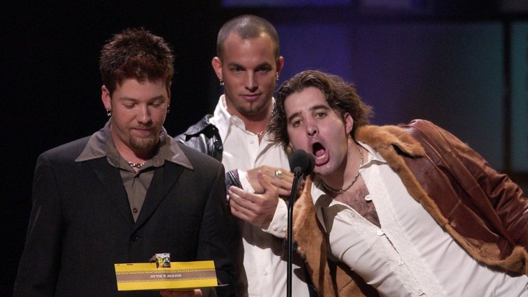 Скот Стап (вдясно) и останалите от Creed тръгнаха по пътя на повторното обединение. Ще се стигне ли отново дотам собствените им фенове да ги съдят?