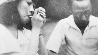 Empress_Wan_Rong_Smoking_Cigarette