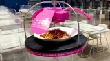 Роботи ще приготвят и сервират храната на олимпийците в Пекин (видео)