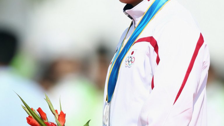 Язава на азиатските игри в Гуанджу през 2010 г., преди да си обръсне главата и са влезе в храма Дзенкоджи