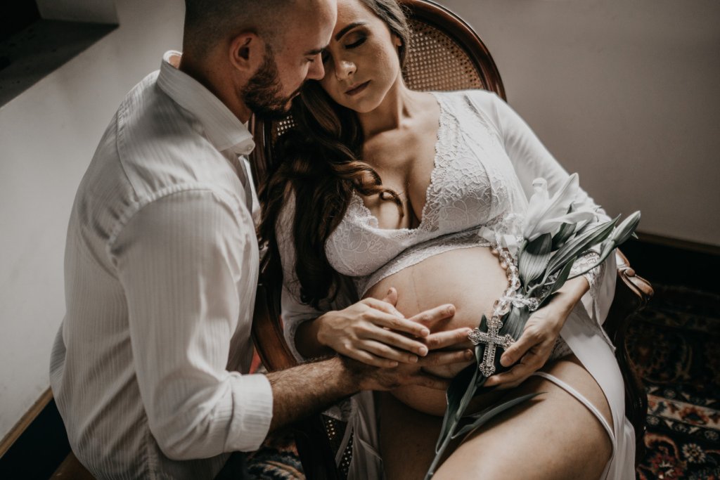 photo-of-pregnant-woman-sitting-on-wooden-chair-3369499