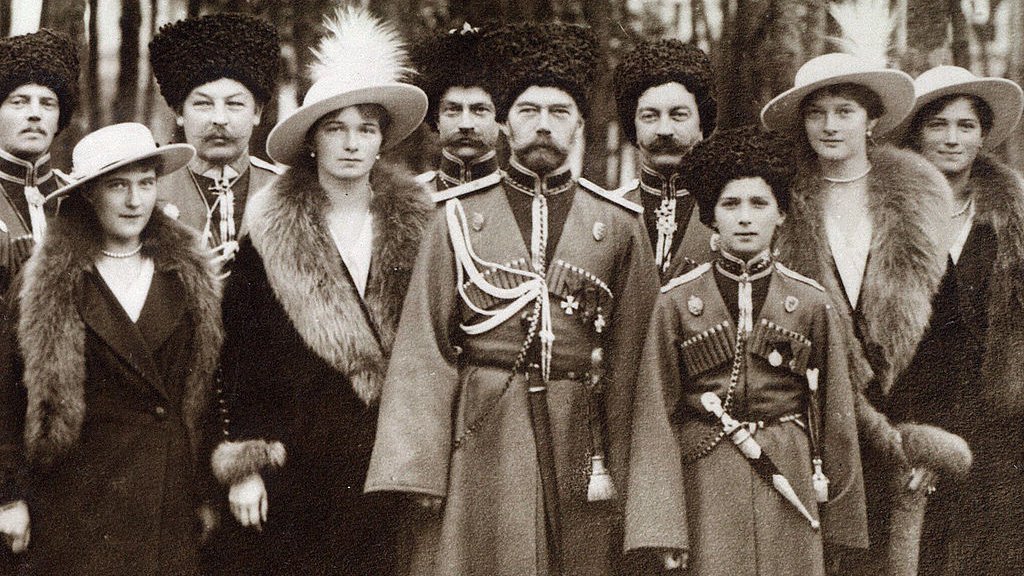 Nicholas_II_and_children_with_Cossacks_of_the_Guard,_cropped