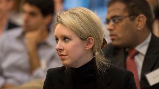 Elizabeth_Holmes_at_a_Nuclear_nonproliferation_discussion_in_2013_-_130417-D-NI589-107_(cropped)