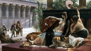 1024px-Alexandre_Cabanel_-_Cléopatre_essayant_des_poisons_sur_des_condamnés_à_mort