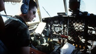 1024px-General_Thomas_M._Ryan_Jr._Flying_a_Lockheed_C-130_Hercules