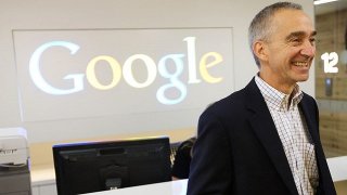 Google CFO Pichette smiles in the new Google office in Toronto