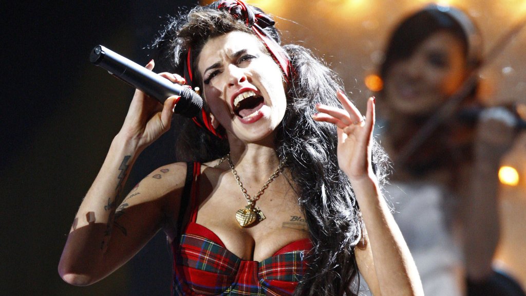 British singer Amy Winehouse performs at the Brit Awards at Earls Court in London