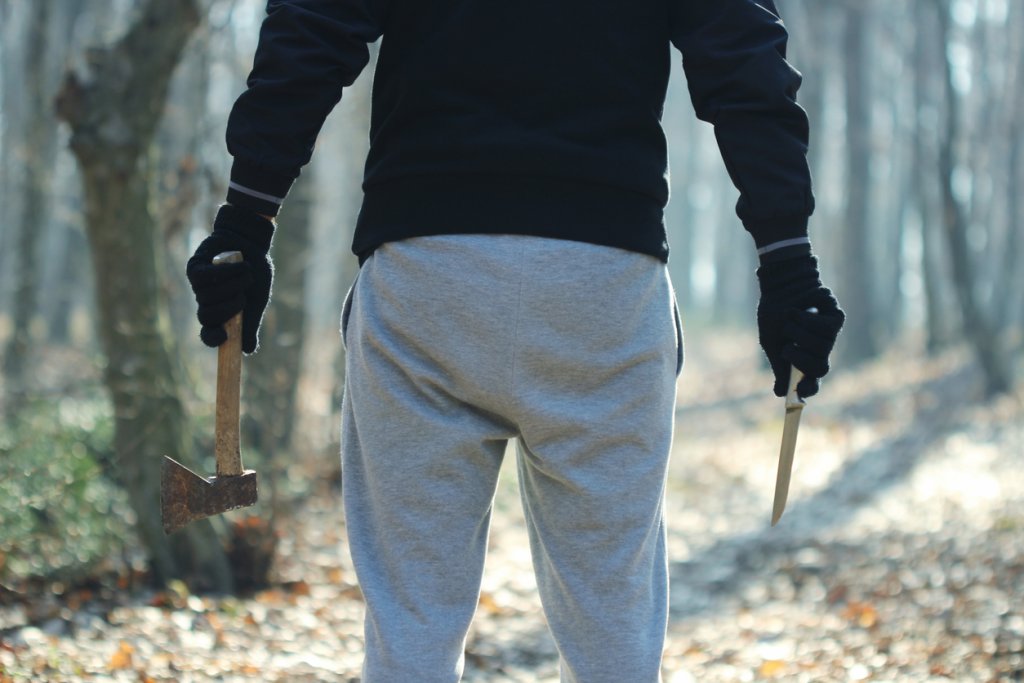 Maniac with knife and ax
