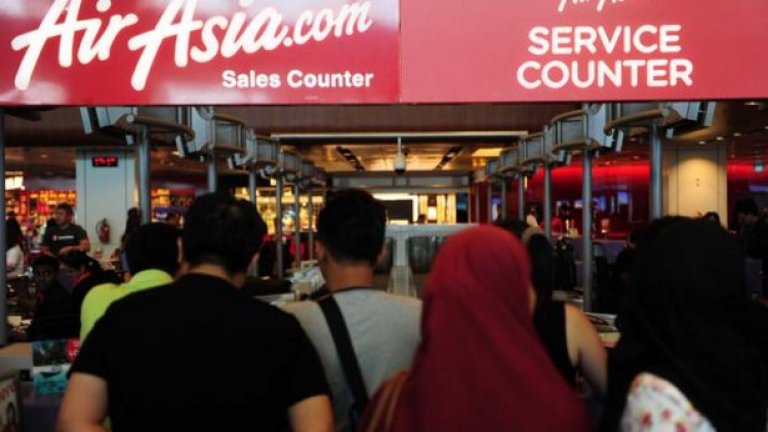 Щанд на Air Asia на летището в Чанги, Сингапур