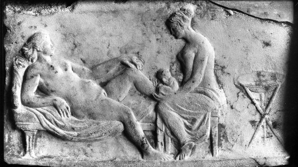 Ancient_Roman_relief_carving_of_a_midwife_Wellcome_M0003964