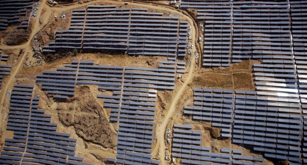 China's largest mountaintop solar power station nears completion amid efforts on emission-cut pledge