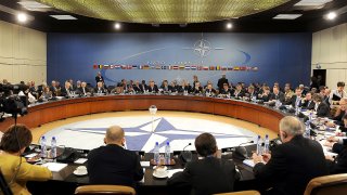 1280px-NATO_Ministers_of_Defense_and_of_Foreign_Affairs_meet_at_NATO_headquarters_in_Brussels_2010