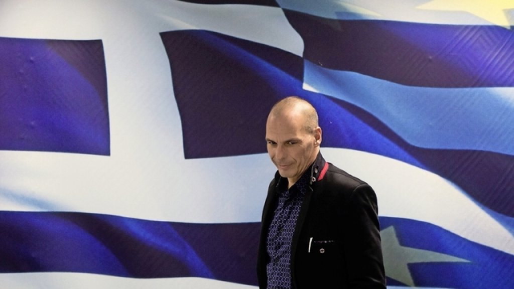 Newly appointed Greek Finance Minister Yanis Varoufakis arrives at a hand over ceremony in Athens