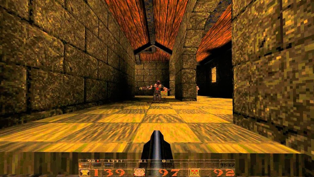 Quake
Още един шутър от първо лице, произведен от iD Software. Тук обаче няма да бъдете запратени в бъдещето и в Космоса, а в миналото и по-точно в Тъмните векове, където ще се наложи да преборите злодей на име Quake. Подобно пътешествие е възможно, тъй като властите вече разполагат с машина на времето, която вие лично ще тествате.
Графиката е изненадващо добра за времето си (1996 г.), а готическата, мрачна и злокобна визия е истинско удоволствие, особено ако играете в затъмнено помещение. Разполагате и с възможност да избирате колко труден да е преходът ви през играта – лесно, средно по трудност, трудно и четвърта степен, наречена “Кошмар“. Заедно с Doom, за Quake се смята, че е сред компютърните игри, по които са оформени много съвременни екшън заглавия – и предназначени само за един играч, и отборни.