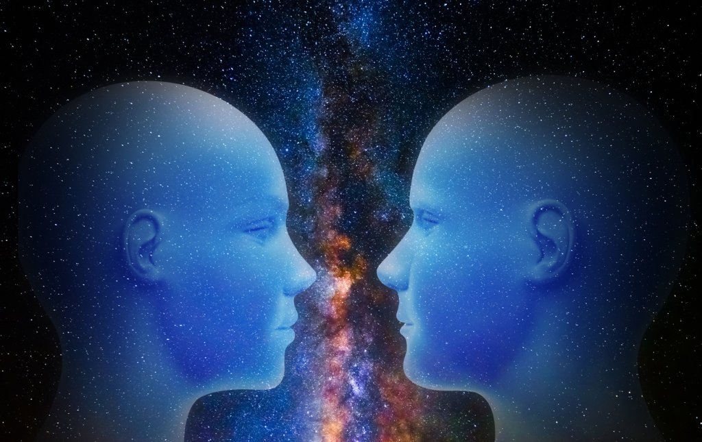 Head of woman and man are part of the universe
