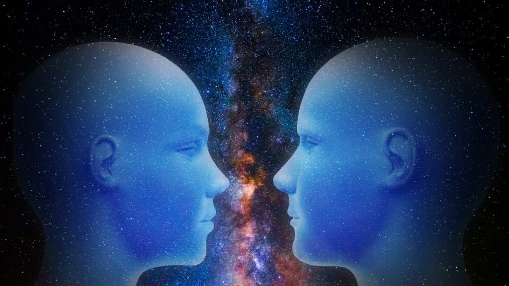 Head of woman and man are part of the universe