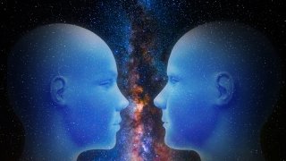 Head of woman and man are part of the universe