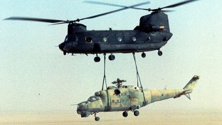 US_Army_160th_SOAR(A)_CH-47_sling-load_a_Mi-24_out_of_Chad-Operation_Mount_Hope_III