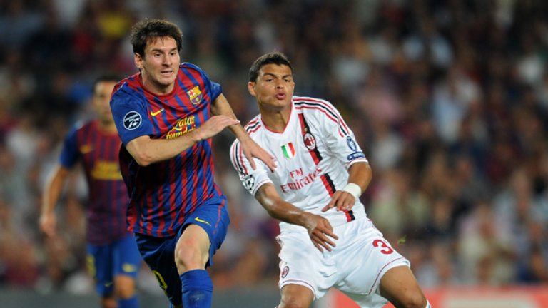 Лионел Меси и Тиаго Силв в двубой по време на първия мач между Барселона и Милан тази година, завършил 2:2