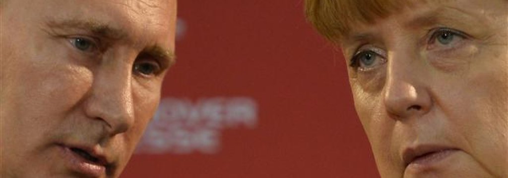 032514putinmerkel2_640x360