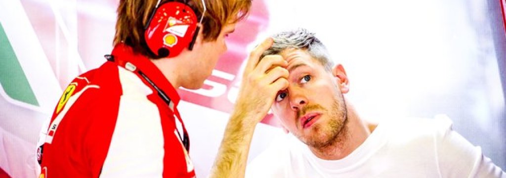 sebastian-vettel-erholte-sich-nach-dem-qualifying-in-der-ferrari-box-