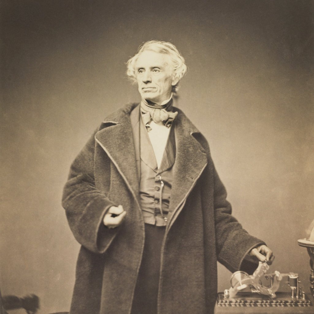 Samuel_Morse_with_his_Recorder_by_Brady,_1857