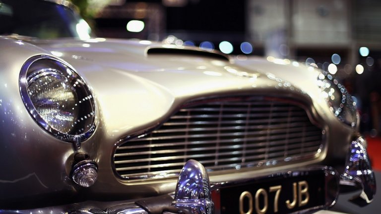 Aston Martin DB5 се появява за последен път на голям екран през 2012 г. в "Координати Skyfall". Тогава публиката и особено запалените фенове на поредицата на Бонд са във възторг, че отново виждат такава класика пред очите си и то кола на 007.

Всъщност обаче двата автомобила, използвани във филма, са "клонинги" на оригиналния DB5. Те са изключително точни копия и е почти невъзможно да бъдат посочени разлики с първообразите им. Това е и причината обаче автомобилите Aston Martin от "Координати Skyfall" да не се продават.