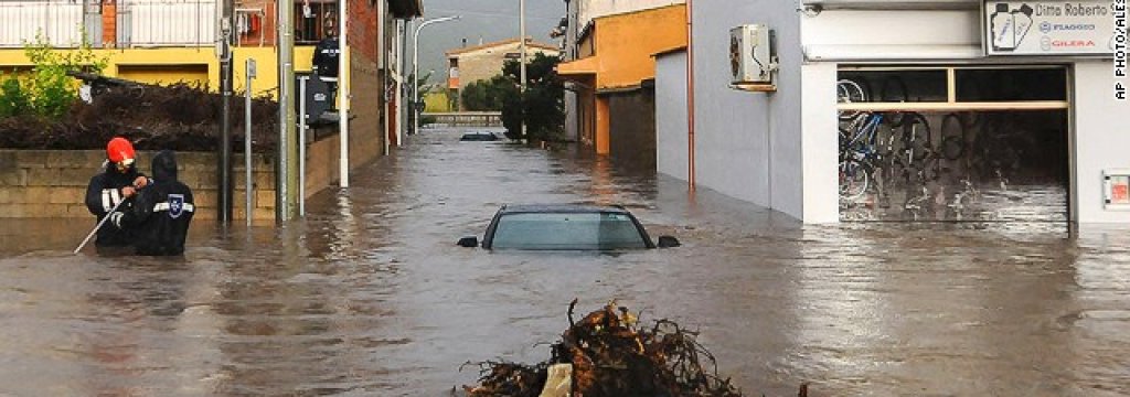 131119123442-italy-storm-submerged-car-story-top