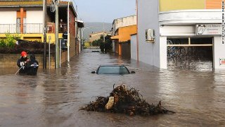 131119123442-italy-storm-submerged-car-story-top