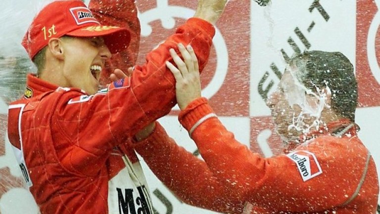 Първата титла с Ferrari - с Жан Тод на подиума на "Сузука" след финала на Гран при на Япония през 2000 година