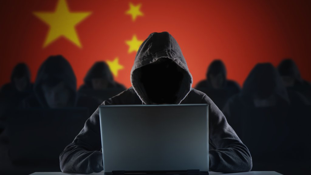 Many chinese hackers in troll farm. Privacy and security concept.