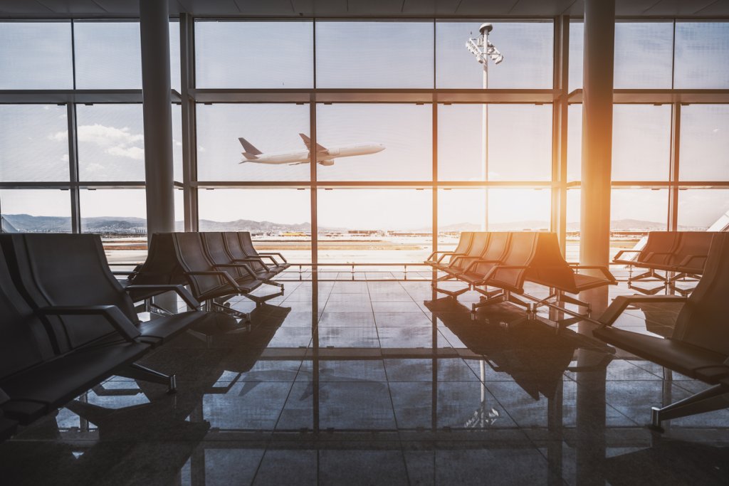 Airport waiting room, flying plane